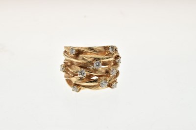 Lot 14 - ESSY - Ten stone diamond dress ring
