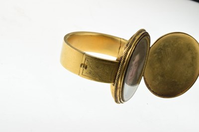 Lot 74 - Early Victorian gilt locket bangle, unmarked