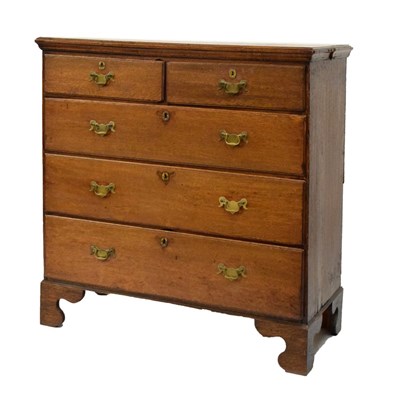 Lot 616 - George III oak chest of two short and three long drawers