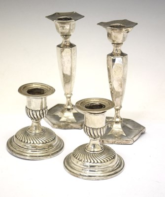 Lot 171 - Pair of Victorian squat silver candlesticks