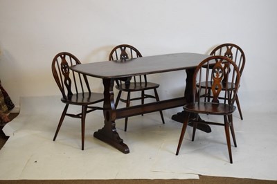 Lot 607 - Ercol dining table & set of four chairs