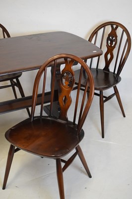 Lot 607 - Ercol dining table & set of four chairs
