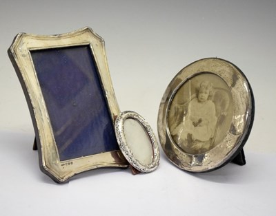 Lot 194 - Three late 19th/early 20th Century silver-mounted easel picture frames