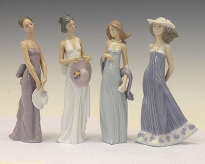 Lot 493 - Four Lladro female fashion figures