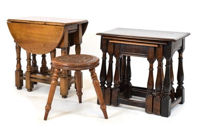 Lot 644 - Modern nest of oak tables, small gateleg table and stool (3)