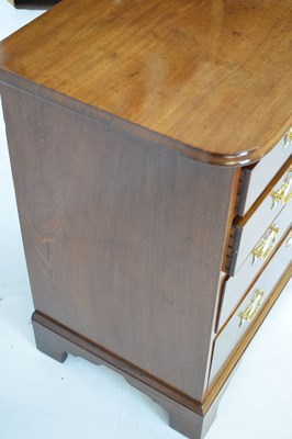 Lot 727 - Mahogany chest of two short over three long drawers with brass swan neck handles