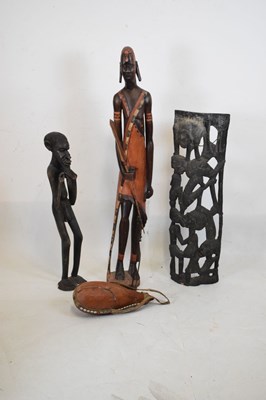 Lot 693 - Large carved painted wooden figure of an African Maasai warrior