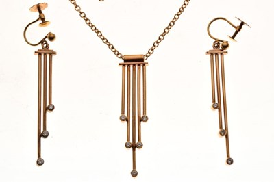 Lot 63 - 9ct gold diamond pendant and earrings set