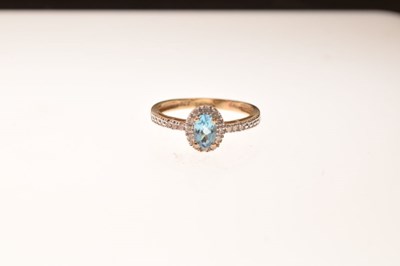 Lot 6 - 9ct gold blue topaz and diamond ring
