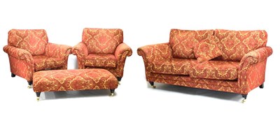 Lot 745 - Parker Knoll three-piece suite and footstool