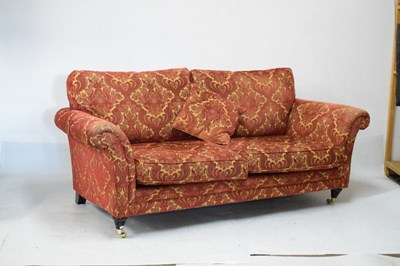 Lot 745 - Parker Knoll three-piece suite and footstool