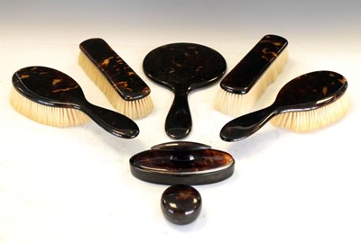 Lot 256 - Tortoiseshell seven-piece dressing table set