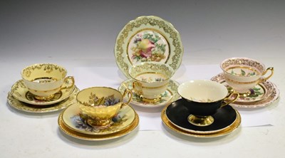 Lot 517 - Five porcelain trios