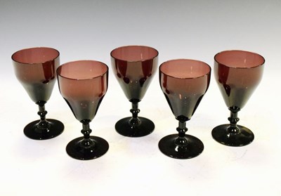 Lot 391 - Five Victorian amethyst wine glasses