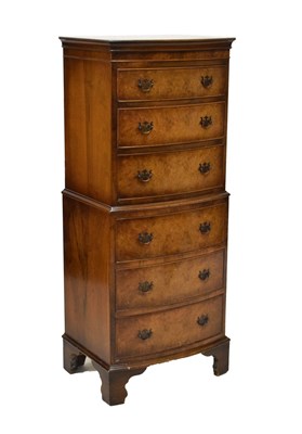 Lot 600 - Reproduction walnut veneer six drawer tall chest/tallboy