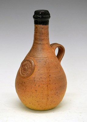 Lot 586 - Somerset 10-year-old Cider Brandy in a presentation Muchelney Pottery stoneware flask