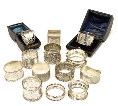 Lot 202 - Thirteen silver napkin rings, 311 grams approx