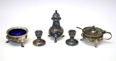 Lot 205 - George VI silver three-piece condiment set together with a pair of dwarf candlesticks