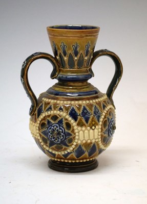 Lot 640 - Doulton Lambeth stoneware two-handled squat vase