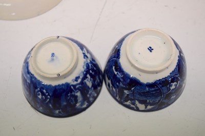 Lot 653 - Pair of early 19th Century blue and white transfer printed tea bowls and saucers