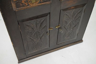Lot 682 - Antique oak cupboard with carved drawers and doors
