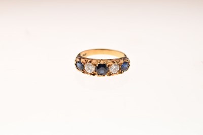 Lot 18 - Yellow metal, sapphire and diamond five stone ring