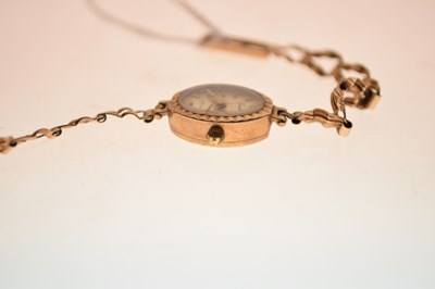Lot 129 - Lady's 9ct gold bracelet watch