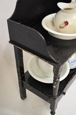 Lot 684 - Black painted washstand with jug and basin