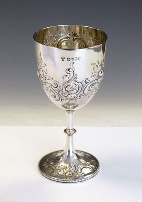 Lot 170 - Victorian silver goblet with embossed floral decoration