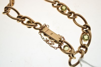 Lot 39 - Yellow metal peridot set bracelet