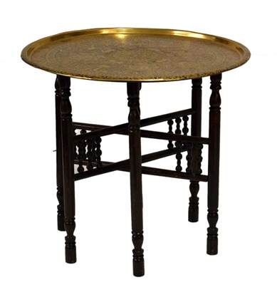 Lot 519 - Benares brass table