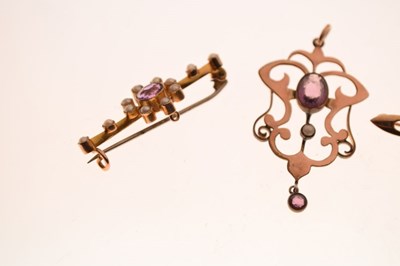Lot 71 - Two purple stone set gold yellow metal brooches etc