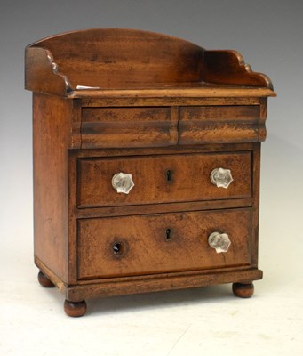 Lot 591 - Miniature chest of drawers