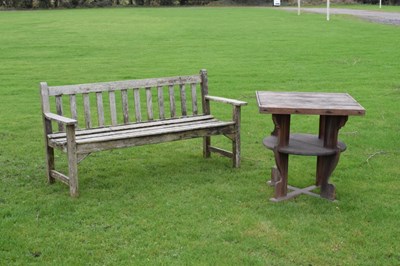 Lot 713 - Teak garden table,  together with a teak three-seater bench