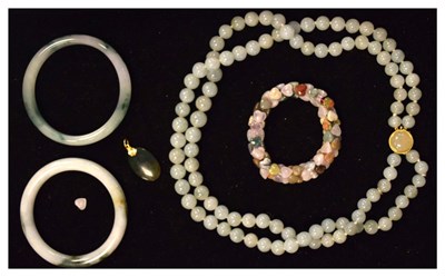 Lot 58 - Jade bangles x2, necklace, pendant and multi-stone braclet