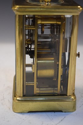 Lot 443 - Brass carriage clock, having a white Roman dial with moon hands