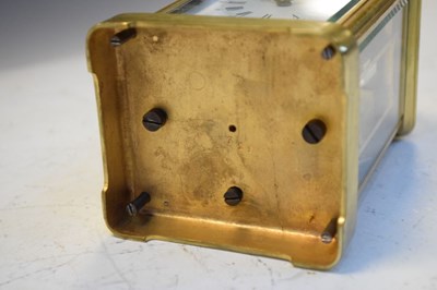 Lot 443 - Brass carriage clock, having a white Roman dial with moon hands