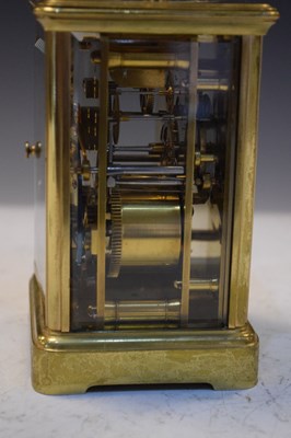 Lot 443 - Brass carriage clock, having a white Roman dial with moon hands