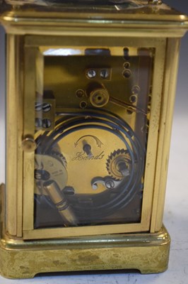 Lot 443 - Brass carriage clock, having a white Roman dial with moon hands