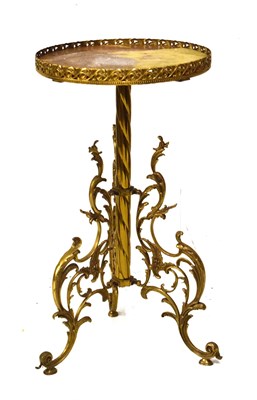 Lot 650 - Gilt metal and onyx plant stand