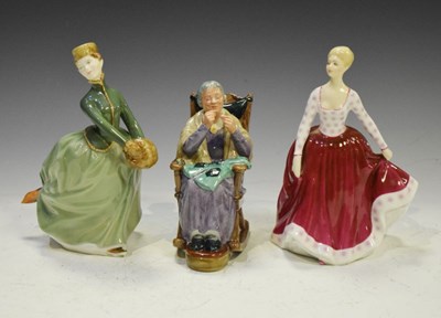 Lot 383 - Three Royal Doulton figures comprising