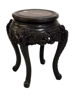 Lot 569 - Chinese carved circular top table