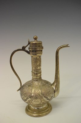 Lot 124 - Persian (possibly Isfahan) white metal ewer, together with a stand and two vases