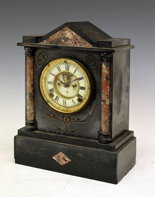 Lot 310 - Black slate and pink marble mantle clock