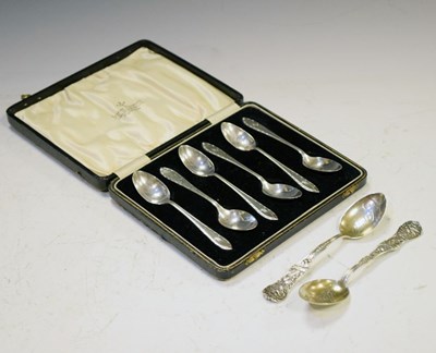 Lot 179 - Cased set of six George V silver teaspoons together with a pair of American teaspoons