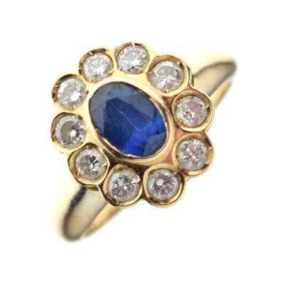 Lot 14 - Unmarked yellow metal sapphire and diamond ring