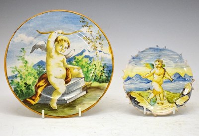 Lot 286 - Two maiolica plates decorated with Cupid