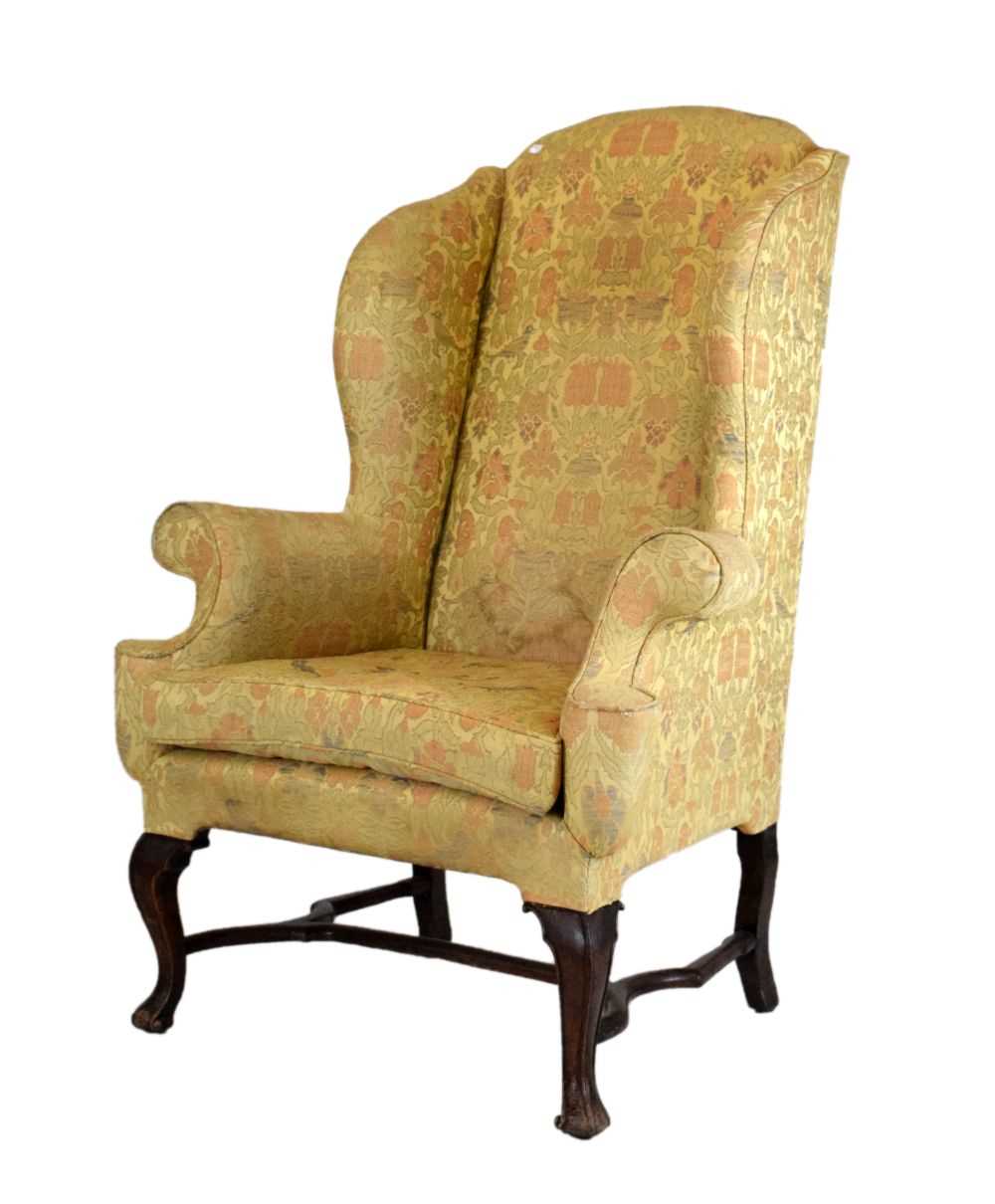 Lot 479 - George III wing back armchair