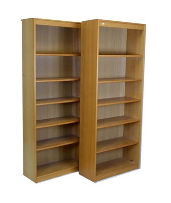 Lot 576 - Pair of modern oak open front bookcases