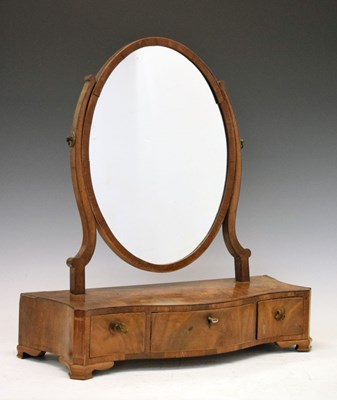 Lot 573 - Mahogany dressing table mirror with a serpentine base